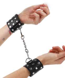 KINK - WRIST RESTRAINTS WITH SNAP FASTEN FULL OF RIVETS BLACK ADJUSTABLE 19-24 CM X 5.5 CM